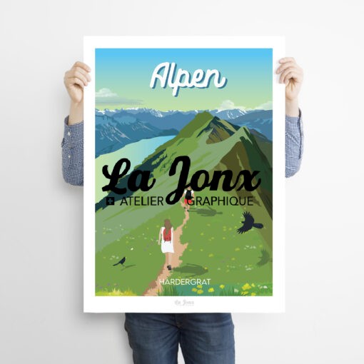 Man holding a poster of Alpen