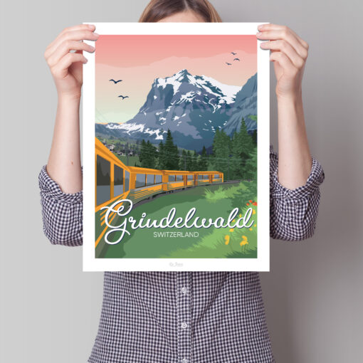 Femme tenant une affiche sur un train à Grinderwald avec la montagne dans un cadre